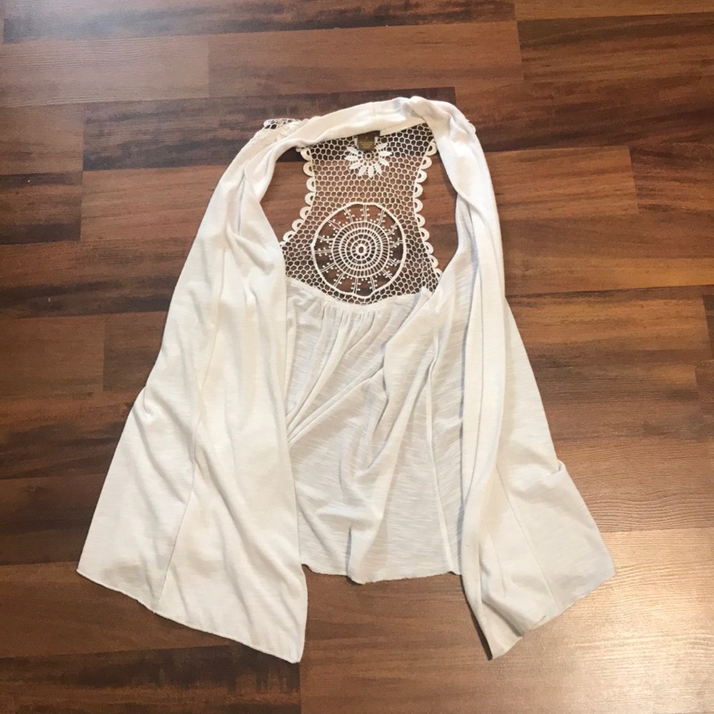 White vest with cut outs